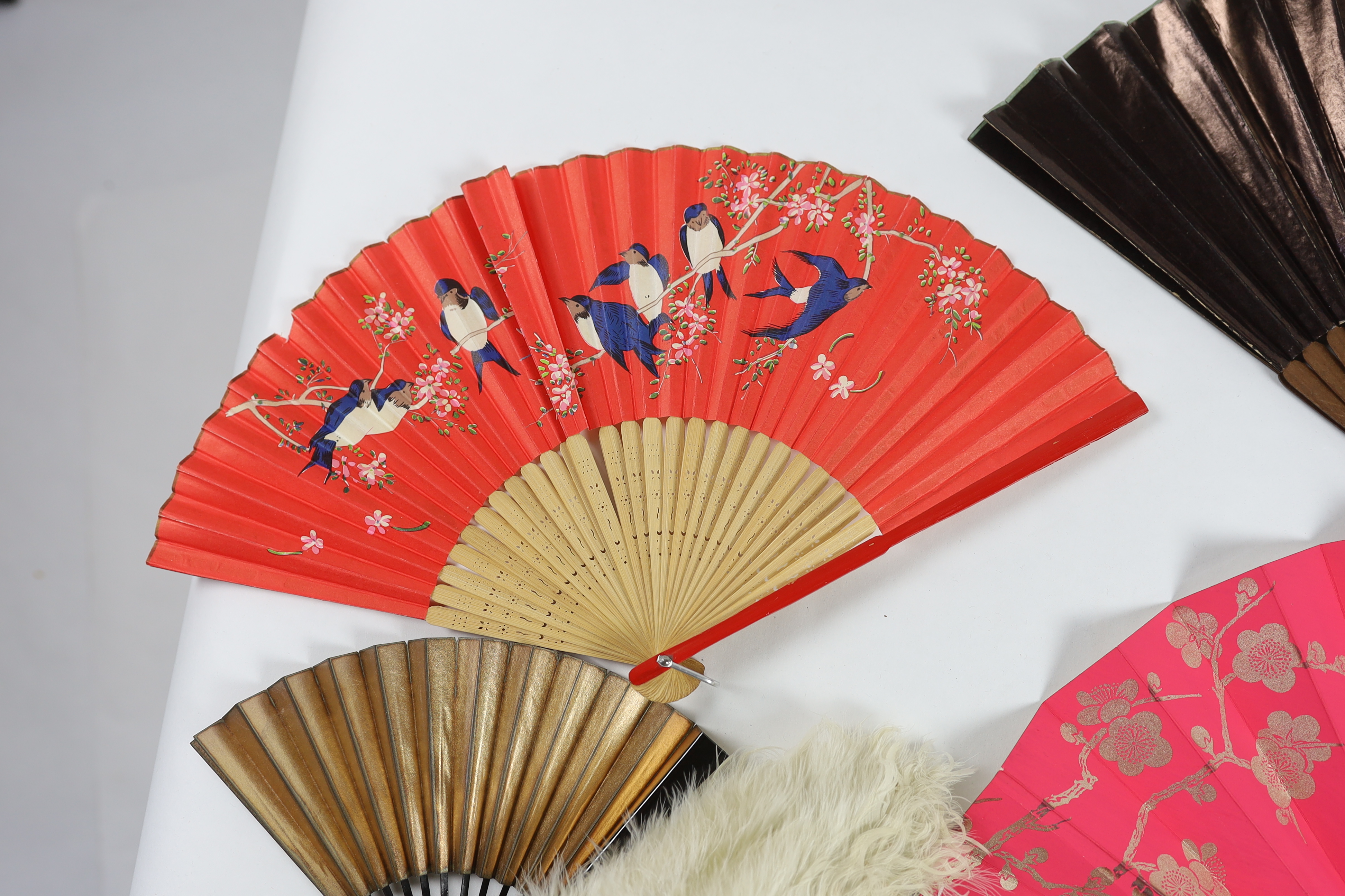 A collection of 19th and 20th century mostly paper fans, ten in reasonable condition useful for stage and film (16)